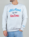Felpa Superculture Girocollo All I need Is My Gin Tonic Art A1357 model wearing light grey sweatshirt with colorful text.