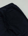 Retro view of Pantalaccio Cotone Leggero Aruba showing elastic waistband and back pocket details in dark color.