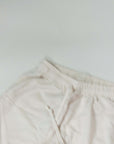 Detail of light beige Pantalaccio Paros, made from linen and rayon blend for comfort and style.