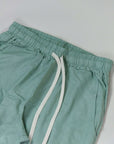 Pantalone verde menta con elastico in vita e cordino, in misto lino e rayon per un comfort ideale.