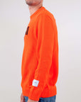 Maglione girocollo Apres Ski di Superculture (art. AK5017) in arancione fluo, dal design originale e dallo stile casual.