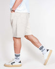 Bermuda Bull denim Mod. Thomas Gianni Lupo, model wearing size 48 shorts in beige with stylish sneakers and socks.