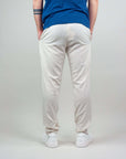 Back view of man's light beige Pantalaccio Paros, made from a linen-rayon blend for comfort and style.