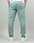 Rear view of light green Pantalaccio Paros men's linen rayón pants, showcasing comfort and stylish design.