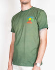 Model wearing T-shirt Fade featuring Sunset Club Paradise art, made of 100% cotton, size L.
