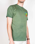 T-shirt Fade featuring sunset club paradise art, model wearing a size L. 100% cotton fabric in green.