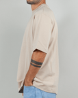 T-shirt in felpa Berna worn by a model showing its side view, perfect for casual outfits.