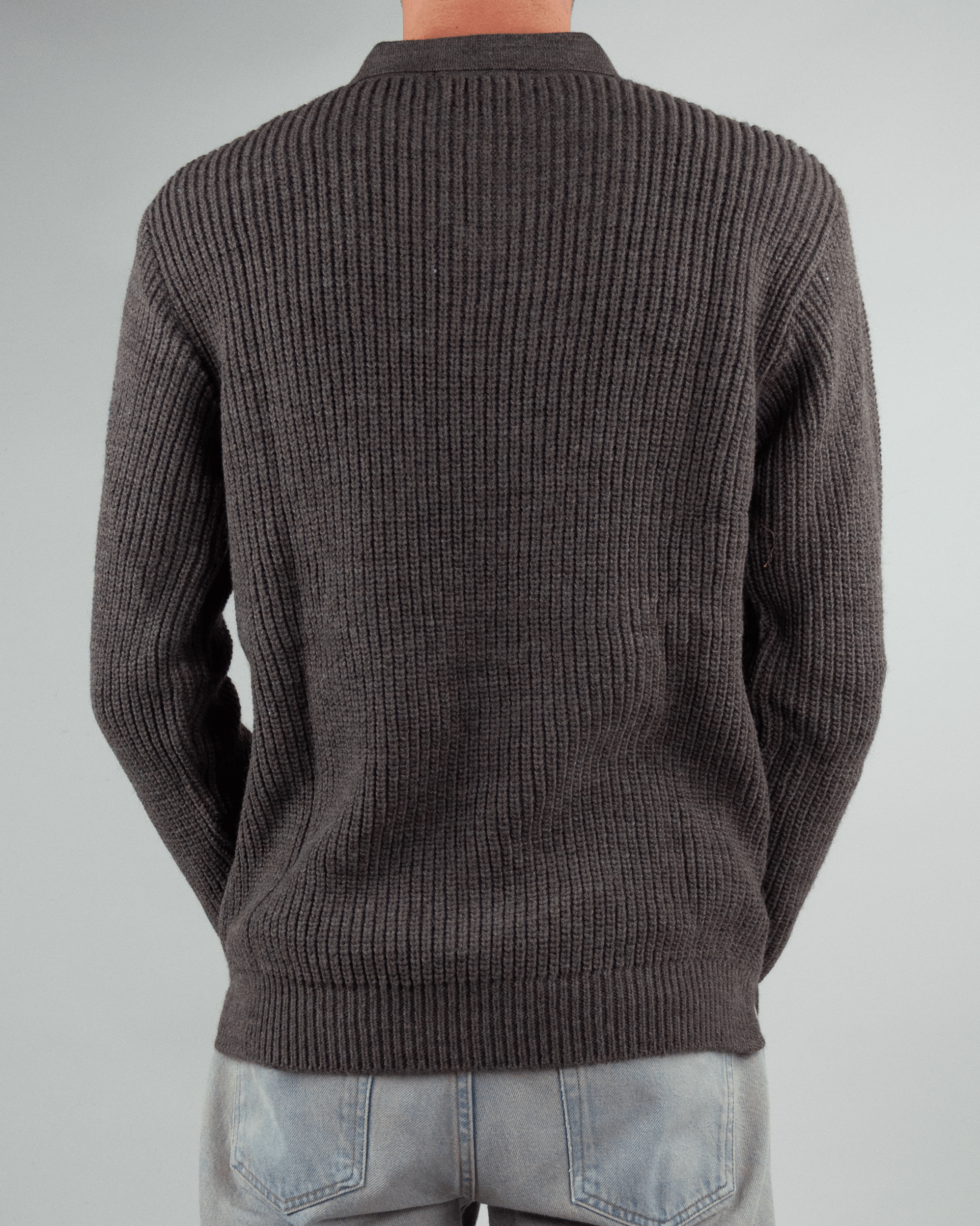 Maglia polo over Block Eleven back view, showcasing ribbed texture and stylish design in dark color.
