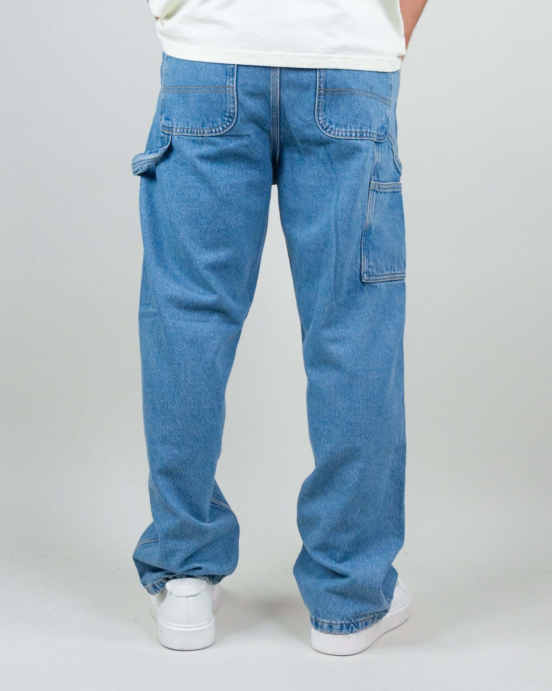 Back view of Jack&Jones Alex Baggy Jeans in light blue, showcasing loose fit design and cargo pockets.