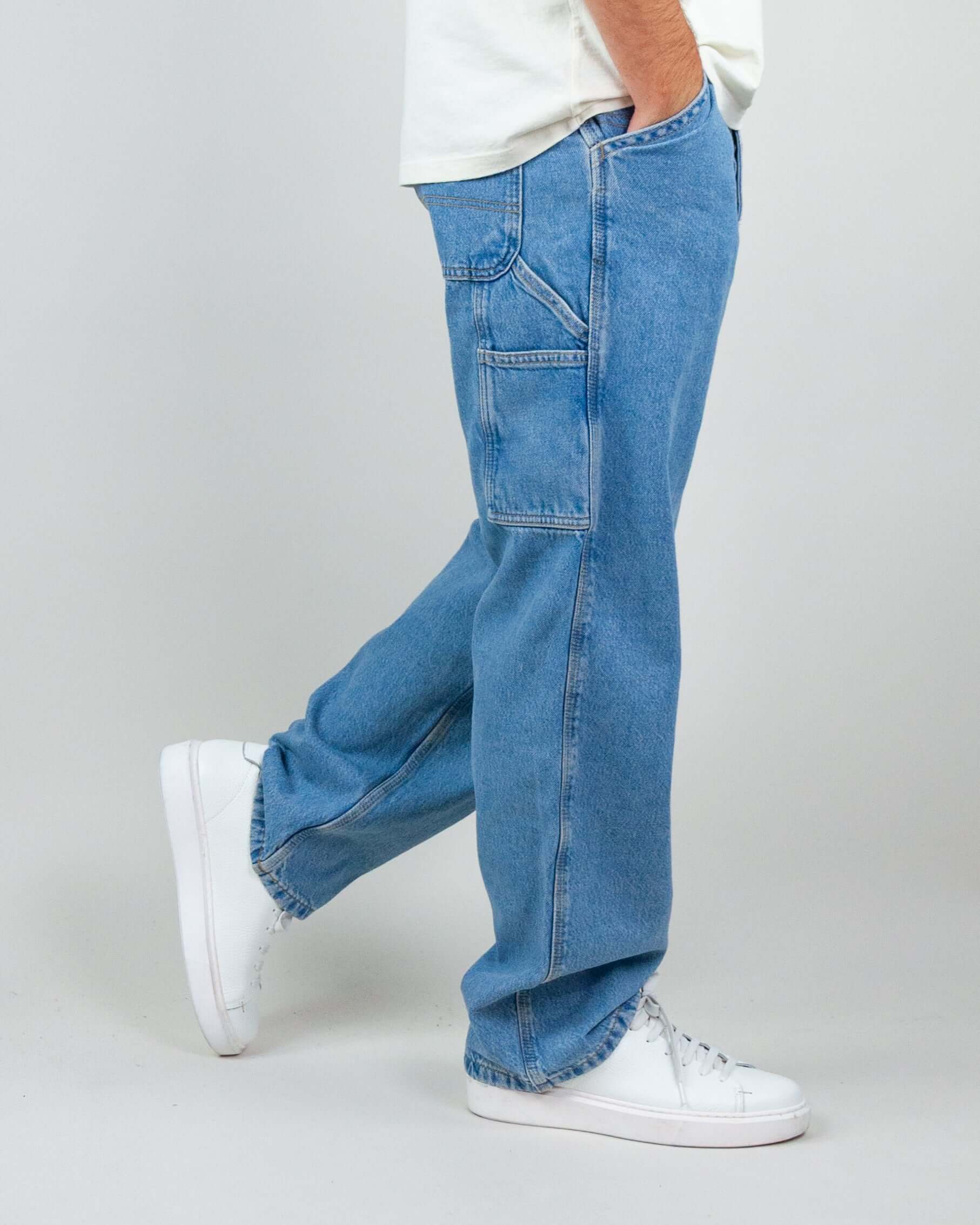 Model wearing Jack&amp;Jones Alex baggy jeans in light blue, featuring a loose fit and casual style.