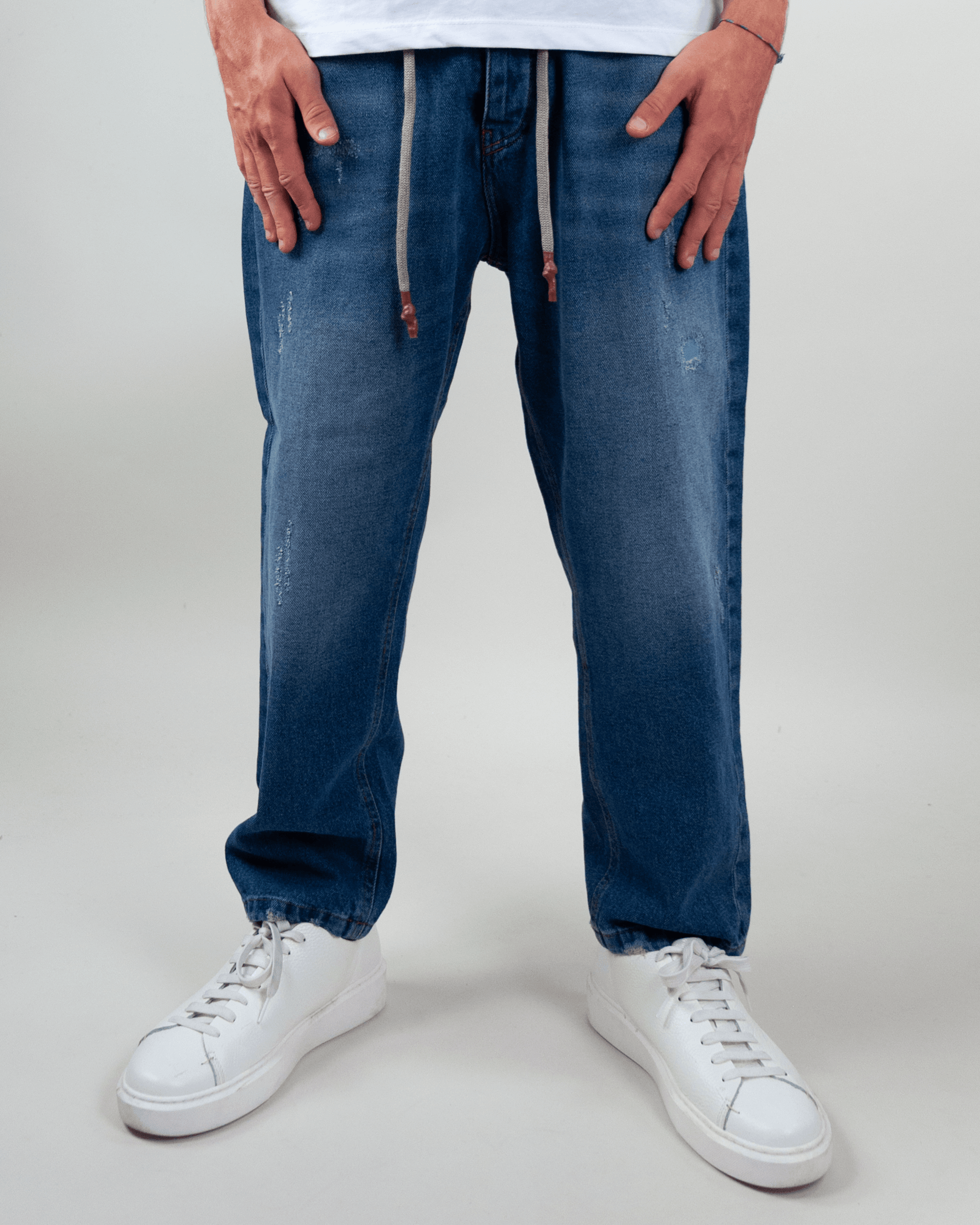 Jeans Coulisse Uomo Art. 08PROCIDA30 in blue, featuring a relaxed fit and drawstring details.