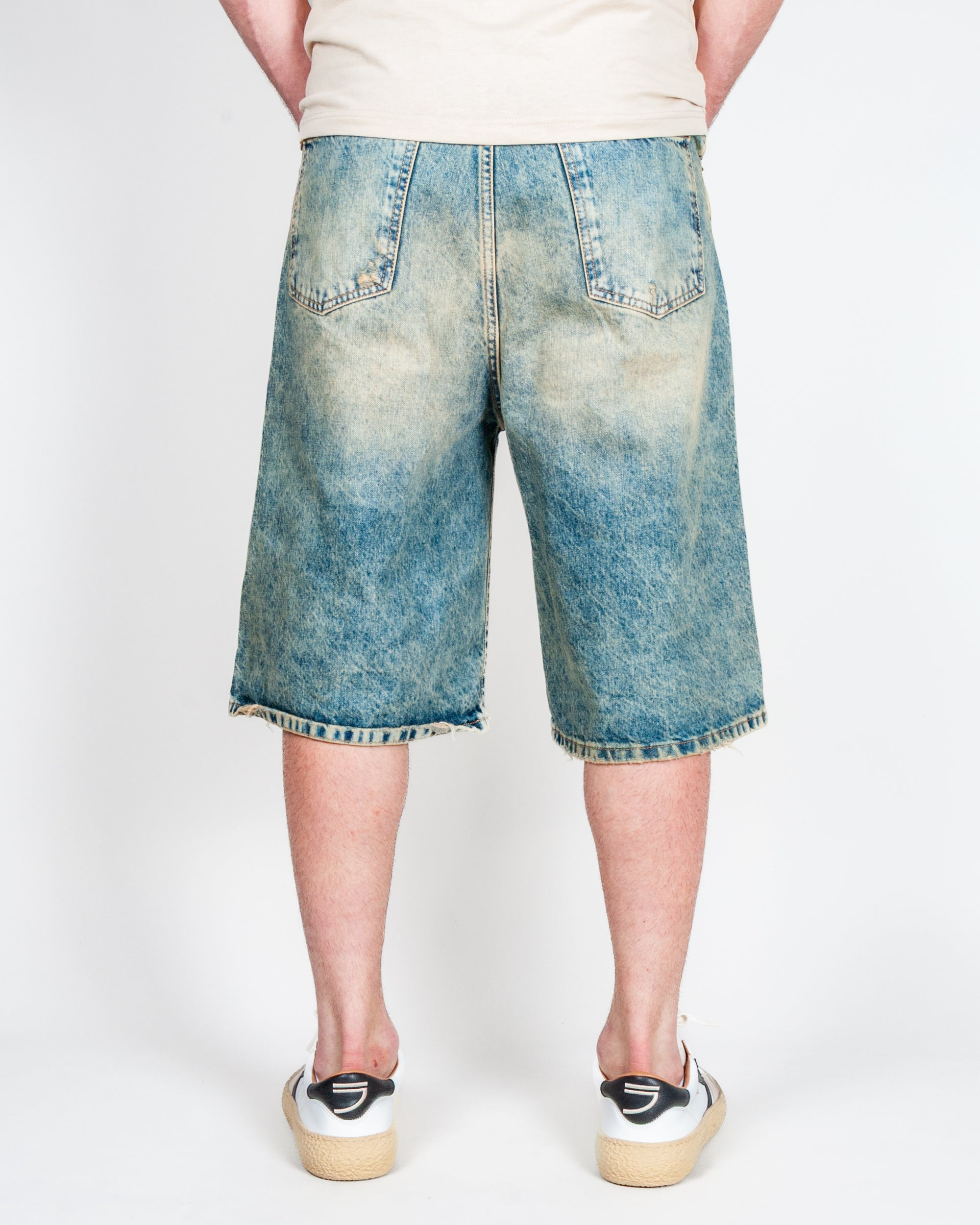 Bermuda Ampio in Denim I'm Brian seen from the back, featuring a light blue wash and casual fit.