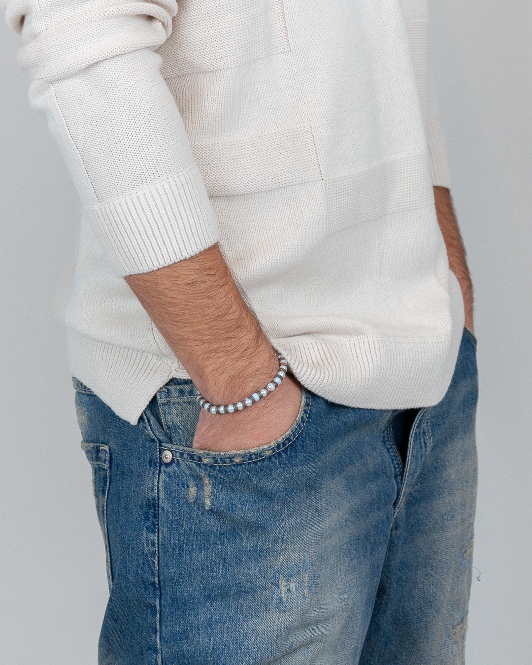 Maglia con texture a quadri e Jeans con lavaggio e strappi - 1921 Store