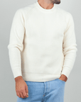 Gianni Lupo Maglia Costine in cream color, ribbed texture, worn by a man with jeans.