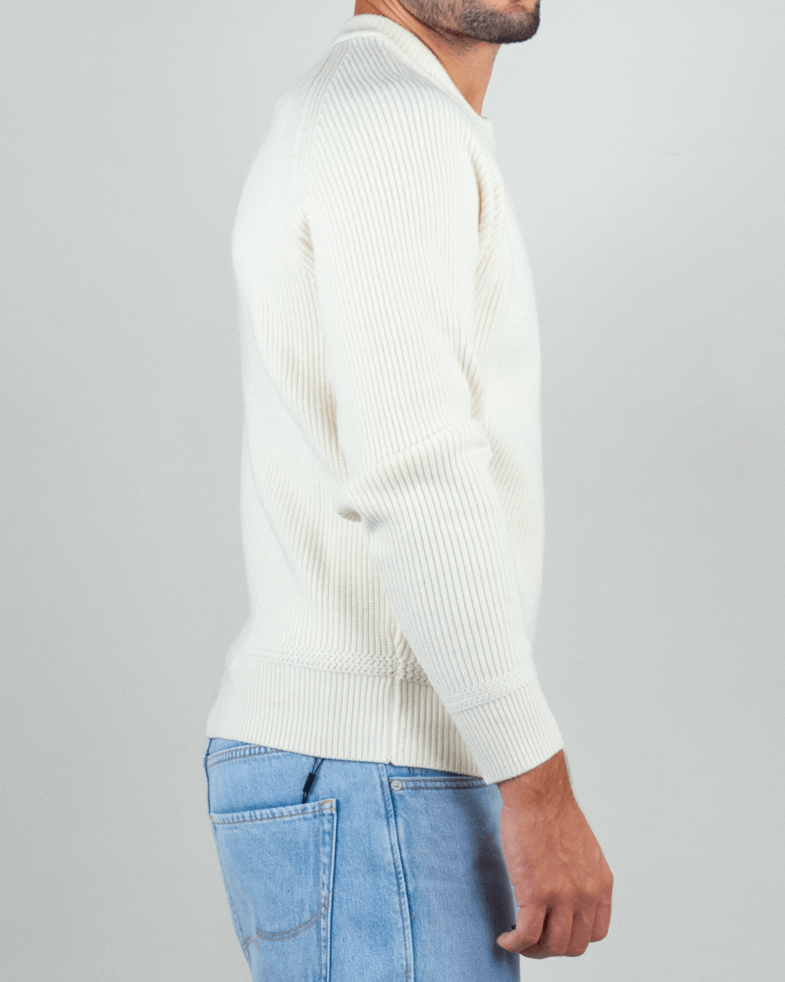 Gianni Lupo Maglia Costine side view in cream color, showcasing ribbed texture and casual style.