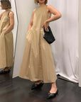 Abito Dixie donna in cotone beige, ideale per ogni stagione, abito donna cotone eleganza, design fresco e comodo.