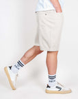 Bermuda Bull denim Mod. Thomas Gianni Lupo worn by a model, showcasing stylish casual footwear and socks.