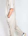 Completo Imperial misto lino in beige, showcasing a stylish outfit with short sleeves and relaxed fit for men.