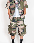 Completo Mimetico Why Not brand camouflage outfit featuring shorts and matching shirt.