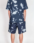 Completo in viscosa from Why Not Brand, featuring a stylish shirt and shorts with floral design in dark colors.
