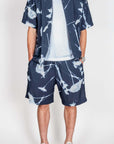 Completo in viscosa by Why Not Brand featuring a stylish shirt and shorts in a navy and white design.